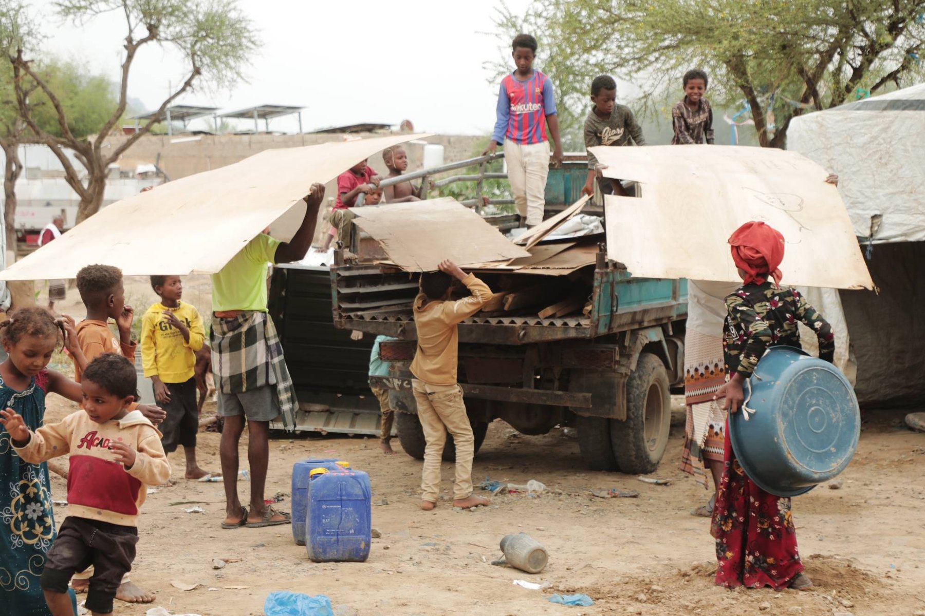 Displaced families dismantling what is left of their shelters to move again, Yemen, September 2026.